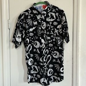 Printed shirt with Halloween icon motif. Never worn with tags size M